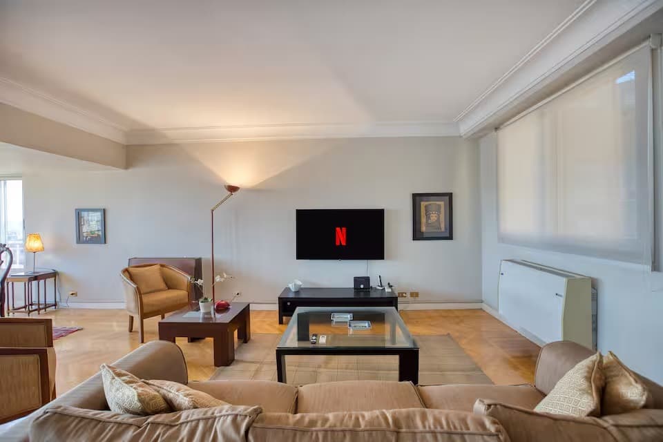 Modern living room with Netflix and comfortable seating