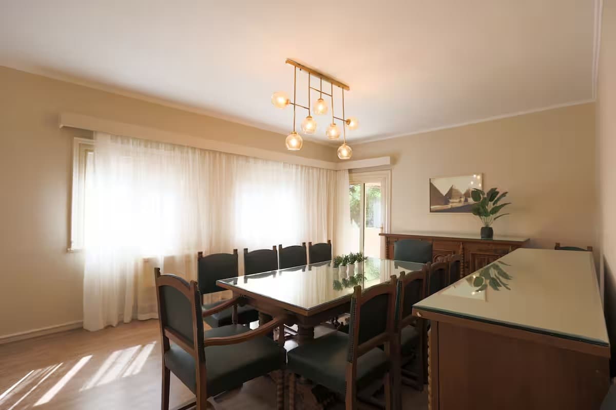 Elegant dining room with modern geometric pendant lighting